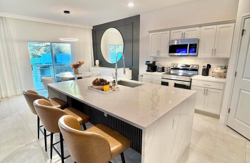 Zephyrhills House | Spacious 4-Bedroom Home with Huge Sunny backyard, Near Busch Gardens/Clearwater
