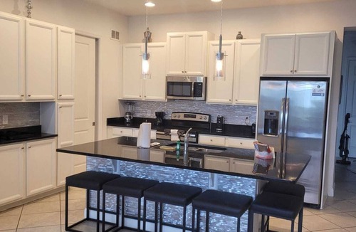 Davenport House | Spacious 5-bedroom townhome in charming Champions Gate/Davenport with AC and gym