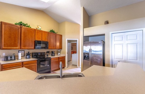 Legacy Park House | Spacious 5BR Family Retreat w Heated Pool, Game Room & Fenced Yard | Sleeps 12 | Near Disney