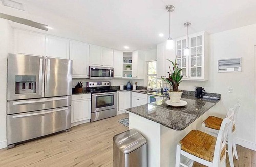 Central Naples House | Spacious & beautiful home with fast WiFi, central AC, patio, and W/D