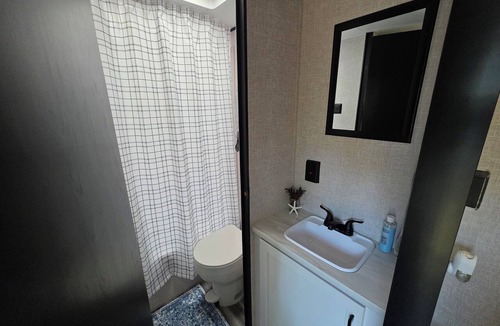 Bell House | Stay at The Rusty Hooker a Cozy Camper in Perry Fl