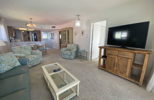 Mid Island Condo | Strandview #304 - Beachfront condo with screened-in patio and amazing view!