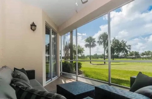North Naples Condo | Stunning Golf Views, Close to the Beach, in the Gated Community of Pelican Marsh