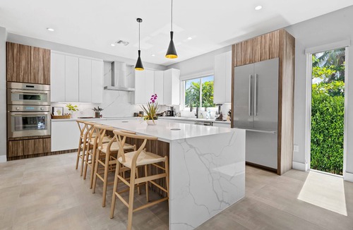 Middle River Terrace House | Stunning Modern Heated Pool Retreat with Scenic Waterway Views Near Beaches!