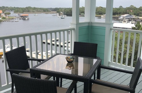 Steinhatchee Condo | Stunning Top Floor Views of The Steinhatchee River with Private Boat Slip/Pool!