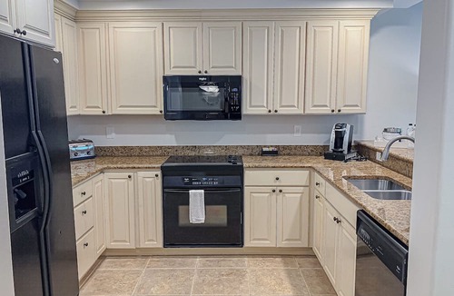 Redevelopment Area Condo | Style, comfort, and convenience-Just a short walk to the heated outdoor pool