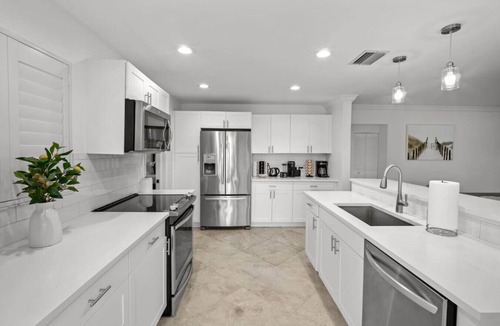 Garden Isles House | Stylish 4BR Oasis | Heated Pool, Spa & Fire Pit