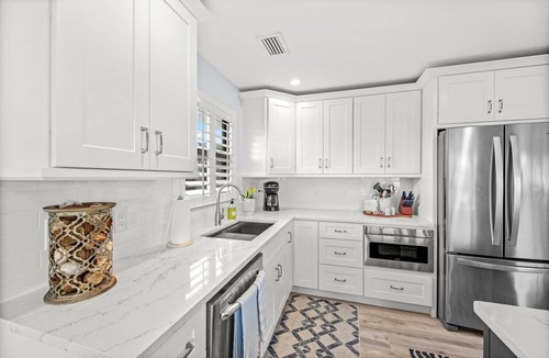 Bonita Springs Villa | Stylish Waterfront Oasis | Pool, Dock, Steps to Beach