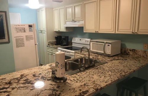 Orange Beach Condo | Sugar Beach 1st floor, Unit 132, 2BR/2BA, Side Gulf View, 3 Pools, 1 Kiddie Pool