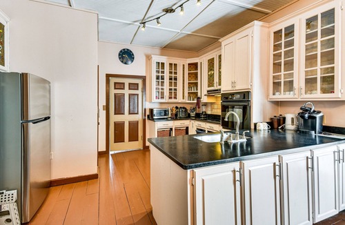 Tallassee House | Sunroom & Decks: Family Home in Tallassee!