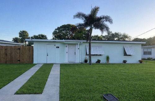 Tradewinds Homes House | Surf and nautical vibe retreat house minutes from beach and endless attractions.
