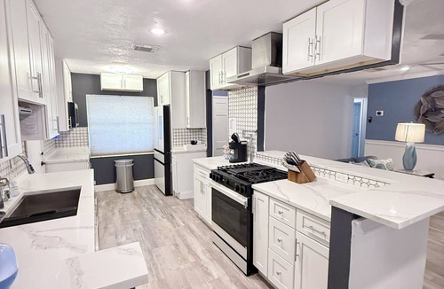 Goldenrod House | The Canopy on Periwinkle- A Home Away From Home