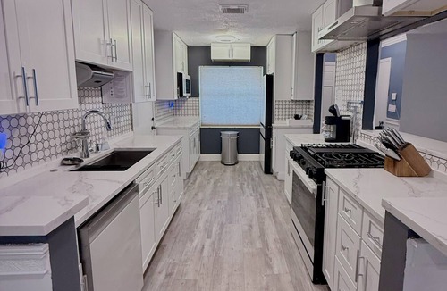 Goldenrod House | The Canopy on Periwinkle- A Home Away From Home