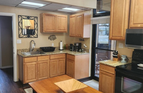 Le Barons Of Titusville Apartment | The Dolphin Flat