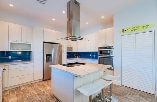 Twin Lakes House | The Key Largo Oasis, a Beautiful Waterfront Home with 60’ Dock and Pool