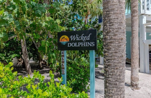Jose's Hideaway House | The Wicked Dolphins - Home with Private Pool & Golf Cart- Sunset Cruise & Ferry Tickets Included!