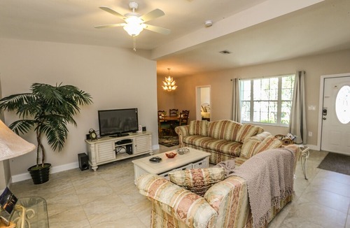 Siesta Isle House | This lovely vacation home with its lush and beautifully manicured landscaping is located on the mainland of Fort Myers Beach, at 18116 Cutlass Drive.