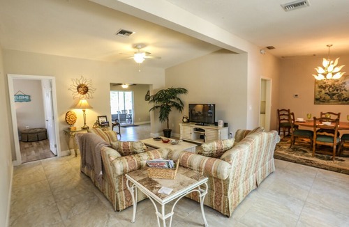 Siesta Isle House | This lovely vacation home with its lush and beautifully manicured landscaping is located on the mainland of Fort Myers Beach, at 18116 Cutlass Drive.