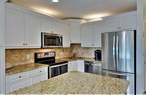Fort Pierce Condo | Tropical Decor Condo, Golf, Tennis, New Rec Center and minutes to private beach.