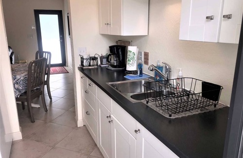 East Fort Lauderdale House | Tropical Garden Apartment is just Steps to Sand, Surf and Fun!