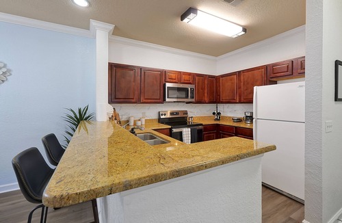 Reunion Apartment | Tuscana Resort with pool 9mi from Disney. No resort fees and two bedroom suites!