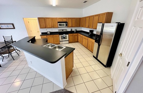 Legacy Park House | Ultra modern, two-story Legacy Park 4/3 Pool Home with formal dining. Pet Friendly!