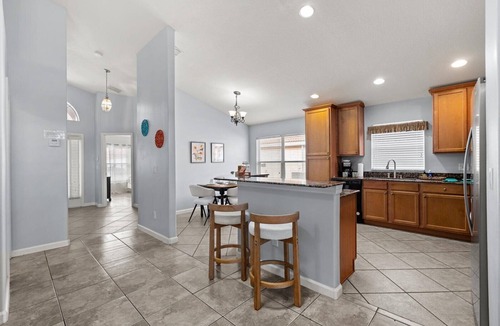 Solana House | Unlock lower rates and empty parks in Orlando. Book your stay today!