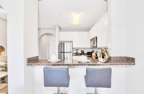 West Kissimmee Condo | Upstay | Disney Area Condo w Pool Pet Friendly
