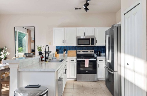 Windwood Bay House | Vacation Home with Private Guest Suite Near Disney
