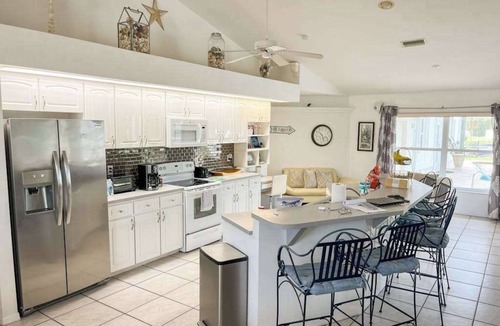 Yacht Club House | Villa Euphoria: Chic 2-unit, canal-front retreat with 2 pools & private dock