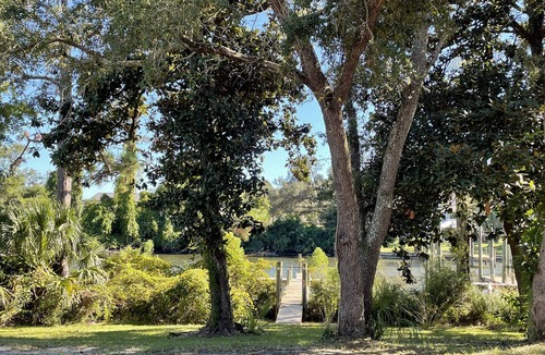 Panama City House | Walk to Old St Andrews from cozy bungalow on Lake Huntington: The Crow’s Nest