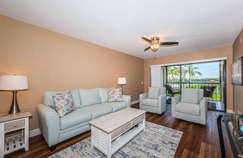 Isla del Sol Villa | Waterfront 2BR/2BA condo in St. Petersburg with pool, hot tub, and balcony.