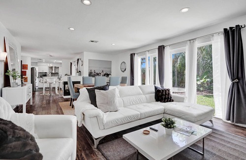 Coral Ridge Isles House | Waterfront 2BR Home Heated Pool BBQ Parking!