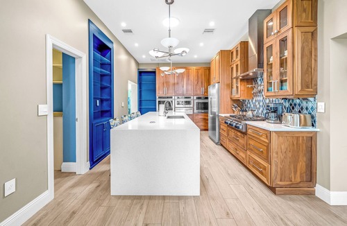 Coral Ridge Isles House | Waterfront Gem! HTD Pool+Hot Tub! 1 Mile To Beach!