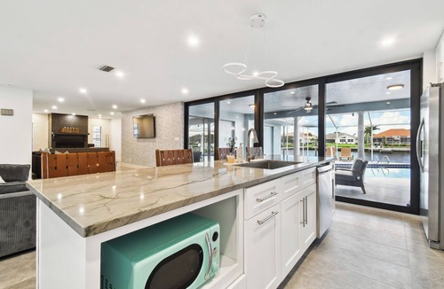 Apollo Beach House | Waterfront, heated Pool, kayaks, Game room, fishing
