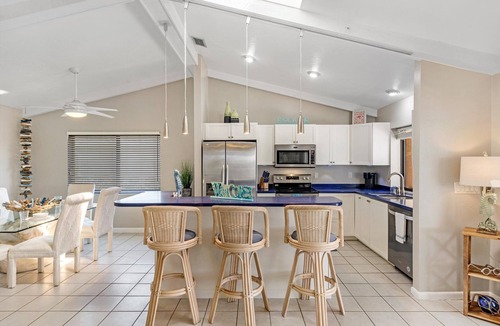 Fort Myers Villa | Waterfront Pet Friendly Villa, Heated Pool & Pool Table- Villa Nautical Breeze - Roelens Vacations