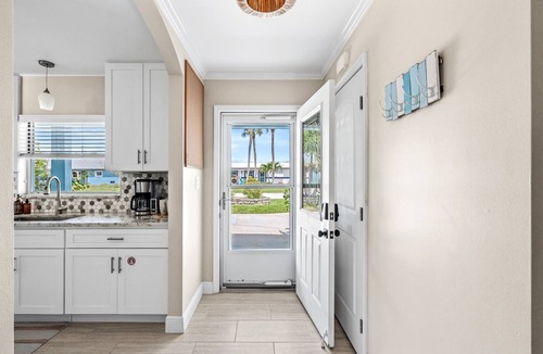 Convair Cove House | Waterfront Pool Home with Dock | Walk to Downtown & Beach | Rocket Launch Views