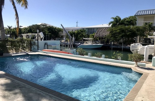 Marathon House | Yellowtail Island Retreat - 3BR Keys Home w/Pool, Dockage, Porch & Canal Access