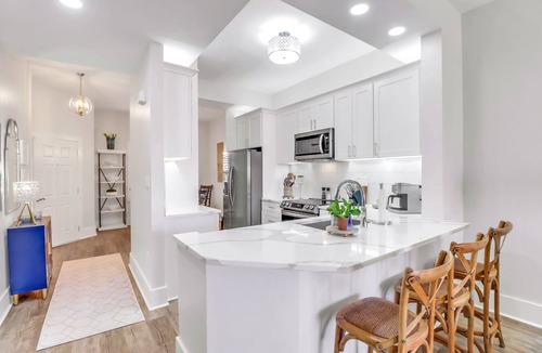 Redevelopment Area Condo | YOUR COASTAL RETREAT, WALK TO BEACH, SHOPPING AND 5TH AVE!