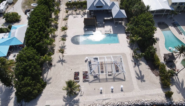 30 DAY RENTAL ONLY! Beautiful 2.5 acre waterfront villa with pool , & tiki bar
