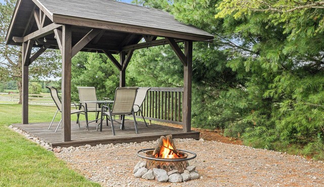Backyard Fire Ring Evenings · Grill & Cornhole in Stanley
