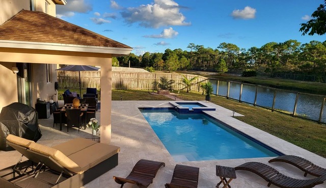 Beautiful upgraded home in Jensen Beach with lake view, heated pool and jacuzzi