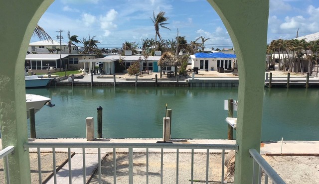 Canal side location with beach & pool club membership!