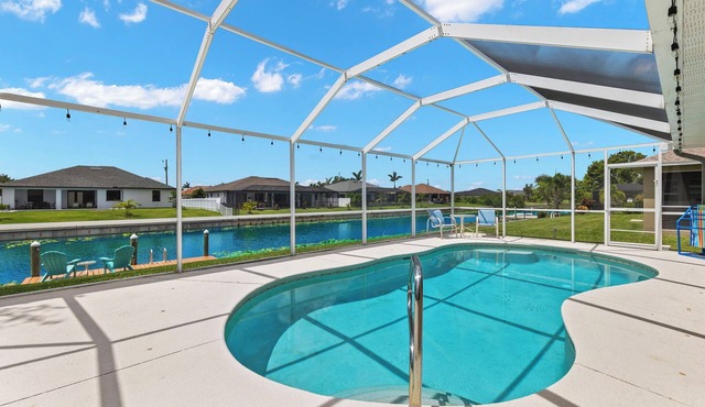 Cape Coral Canalfront Oasis: Private Dock, Heated Pool & Arcade Fun