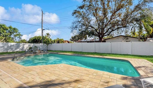 Coastal home with private pool, arcade games, and firepit