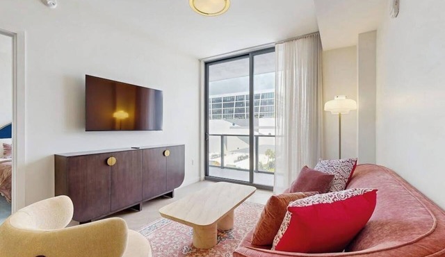 Contemporary condo with rooftop pool, balcony & designer amenities