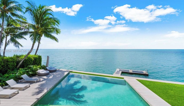 Exceptional 6-bedroom ocean villa in Key Biscayne featuring infinity pool & more