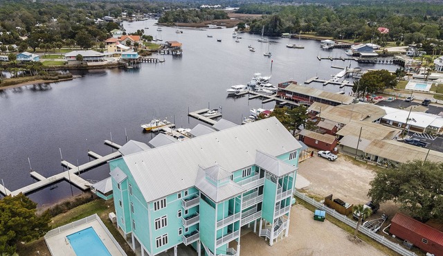 Fish, Scallop & Relax 👉 Waterfront Condo with Boat Slip + Elevator + Pool