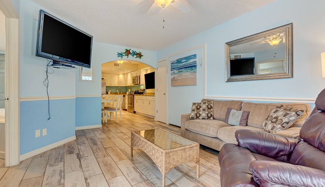 Ground floor condo w/shared pool, fast WiFi, central AC, near beach access