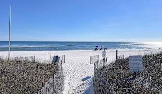 Gulf front condo with onsite snack bar, three shared pools, and internet